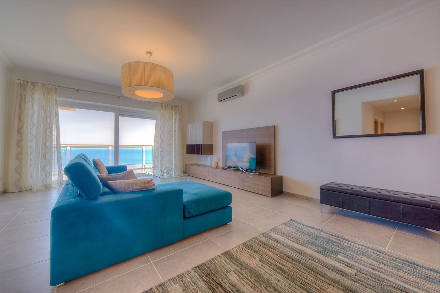 Apartment, 2 Bedrooms | Living room | 50-inch LCD TV with cable channels, Smart TV