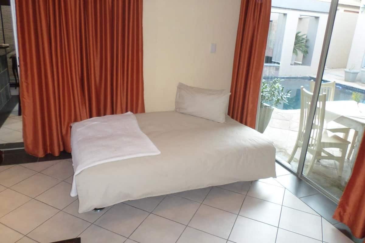 Phòng Suite dành cho gia đình, 1 phòng ngủ, phòng tắm dùng chung, quang cảnh hồ bơi | Bộ trải giường bằng vải cotton Ai Cập, bộ đồ giường cao cấp