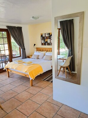 Standard Double Room, Patio | 1 bedroom, in-room safe, individually decorated, individually furnished - Inn2Wilderness Guesthouse (Wilderness)