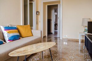 Apartment, 1 Bedroom | Living area | Flat-screen TV