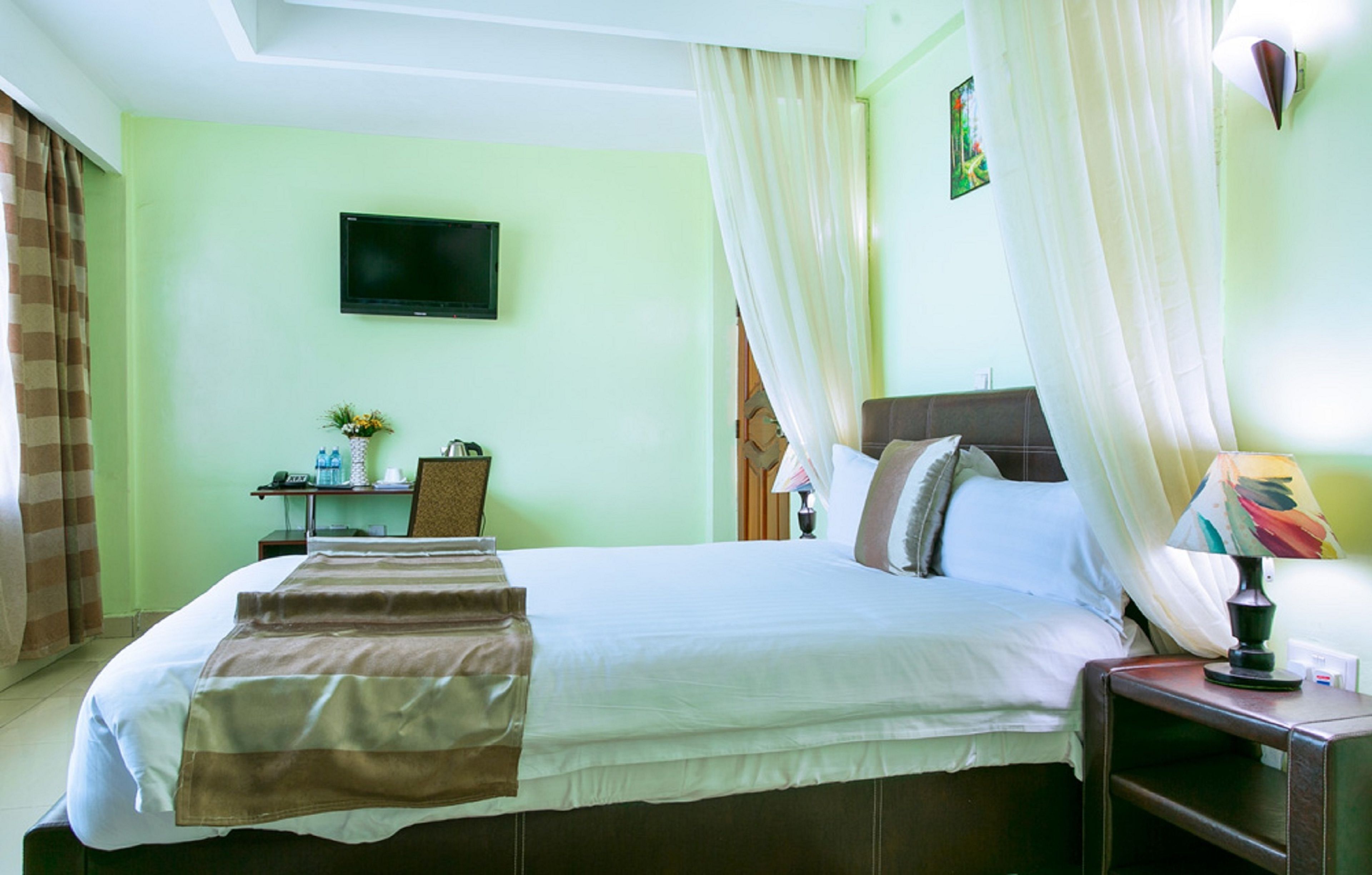 Desk, blackout curtains, free WiFi, bed sheets