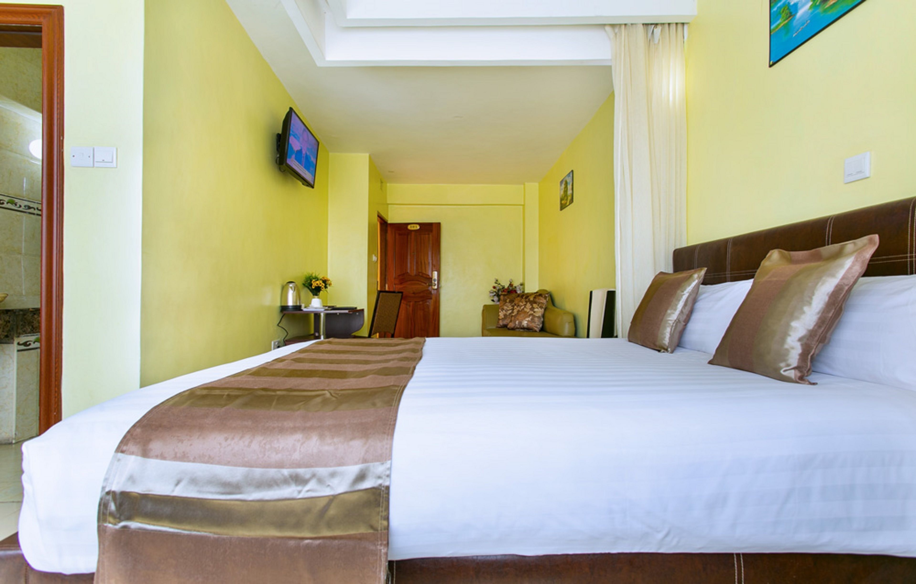 Desk, blackout curtains, free WiFi, bed sheets