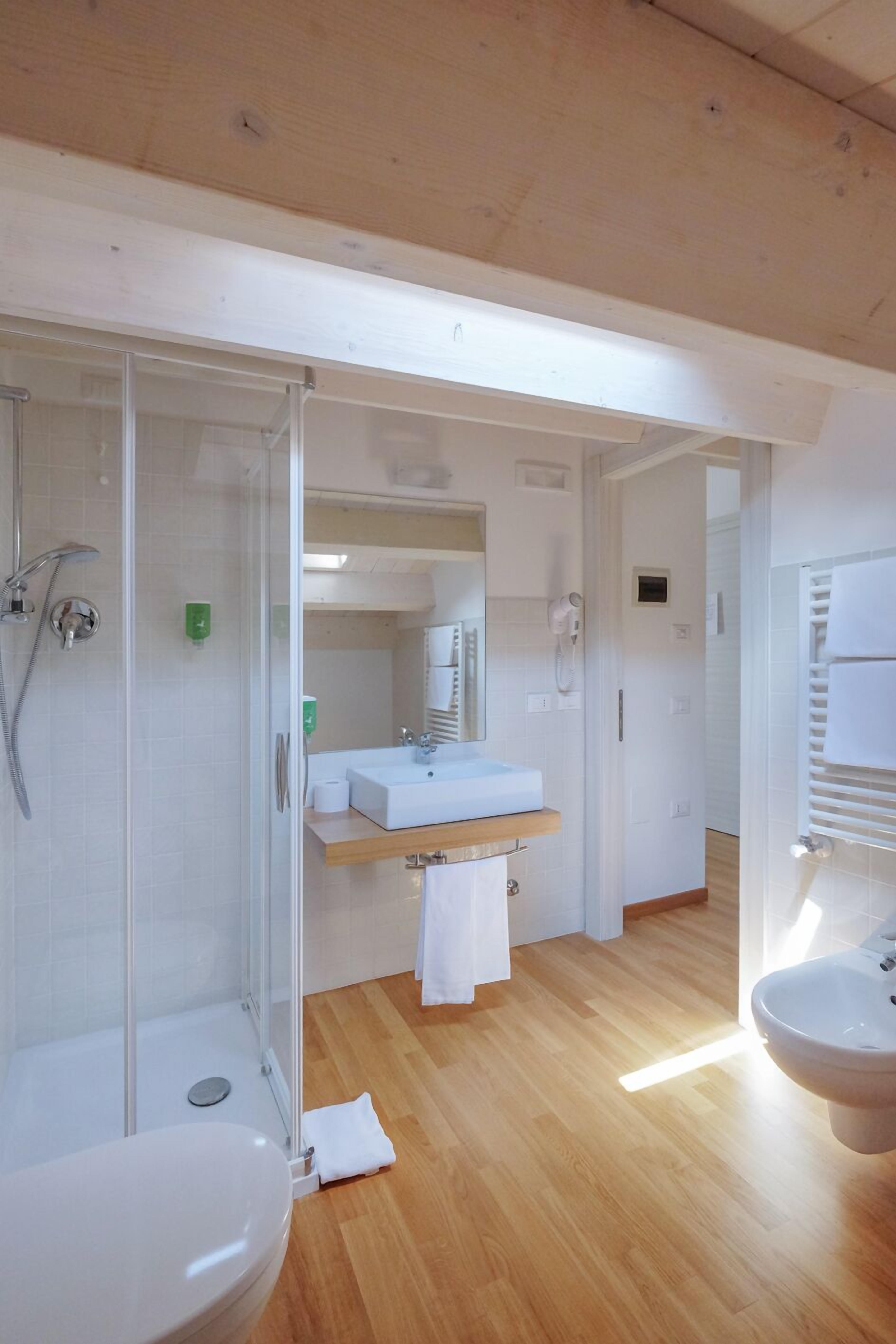 Shower, eco-friendly toiletries, hair dryer, bidet