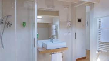 Shower, eco-friendly toiletries, hair dryer, bidet