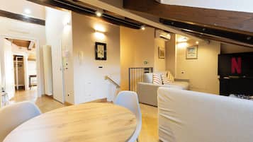 Luxury Apartment, Balcony, City View (Attic) | Living area | 40-inch flat-screen TV with digital channels