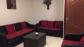 Comfort Apartment, 2 Bedrooms | Living room | 32-inch flat-screen TV with satellite channels, TV - Imarati Appart 1 (Tangier)