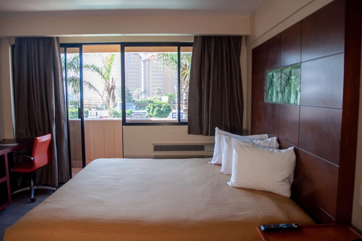 Standard Room, 1 King Bed | Down comforters, desk, laptop workspace, blackout drapes