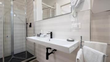 Regadera, amenidades de baño gratuitas, secadora de cabello, bidet
