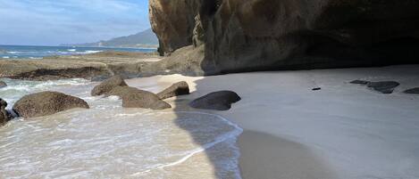 On the beach, sun loungers, beach towels