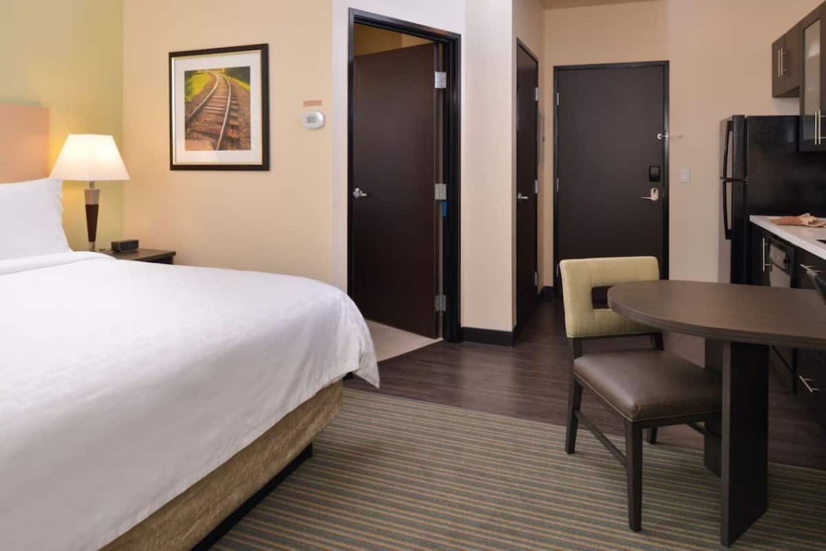 Premium bedding, desk, blackout curtains, iron/ironing board