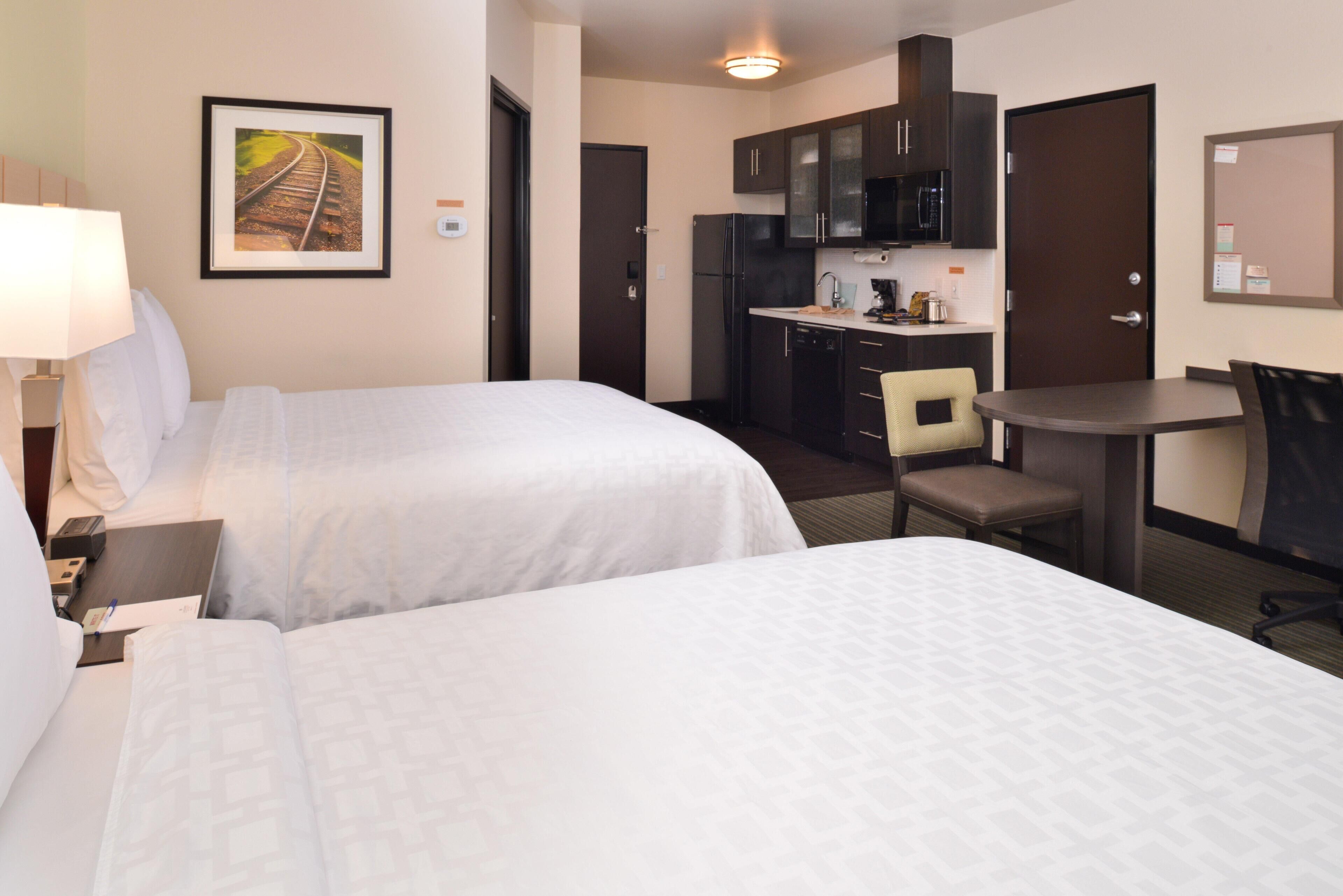 Premium bedding, desk, blackout drapes, iron/ironing board