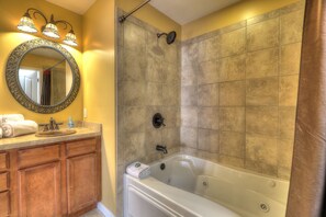 Jetted bath, towels, toilet paper