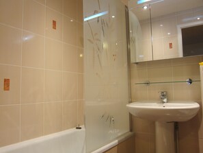 Combined shower/tub