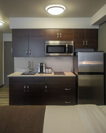 Studio Suite, 2 Queen Beds, Non Smoking | Pillowtop beds, desk, iron/ironing board, cribs/infant beds