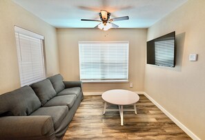 The Bluebonnet Suite | Living area | Flat-screen TV