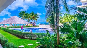 Outdoor pool - Beautiful Ground Floor Two Bedroom Suite at Ixchel (Isla Mujeres)