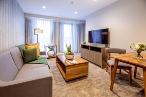 Flat-screen TV, iPod dock