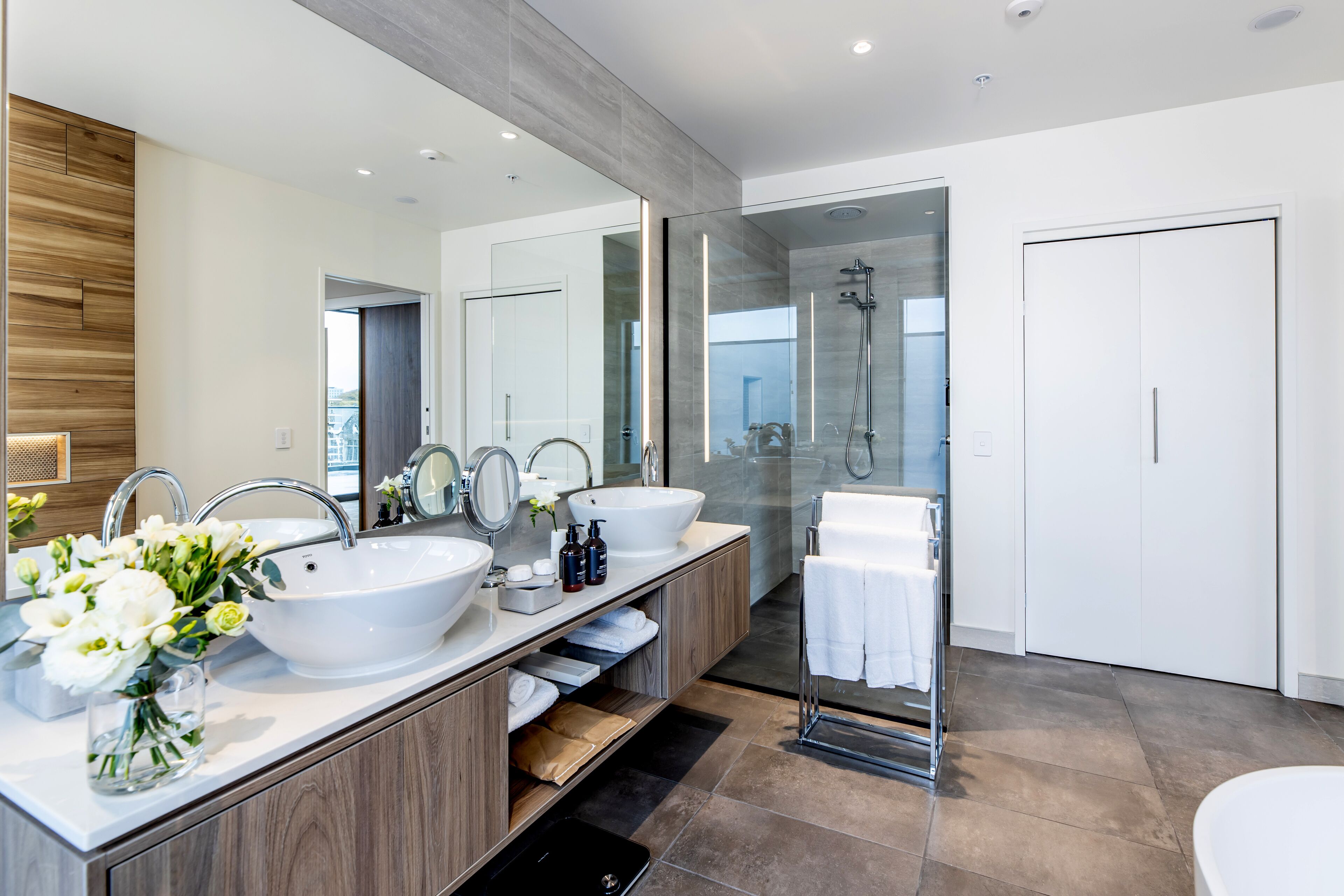 shower, hair dryer, bathrobes, slippers