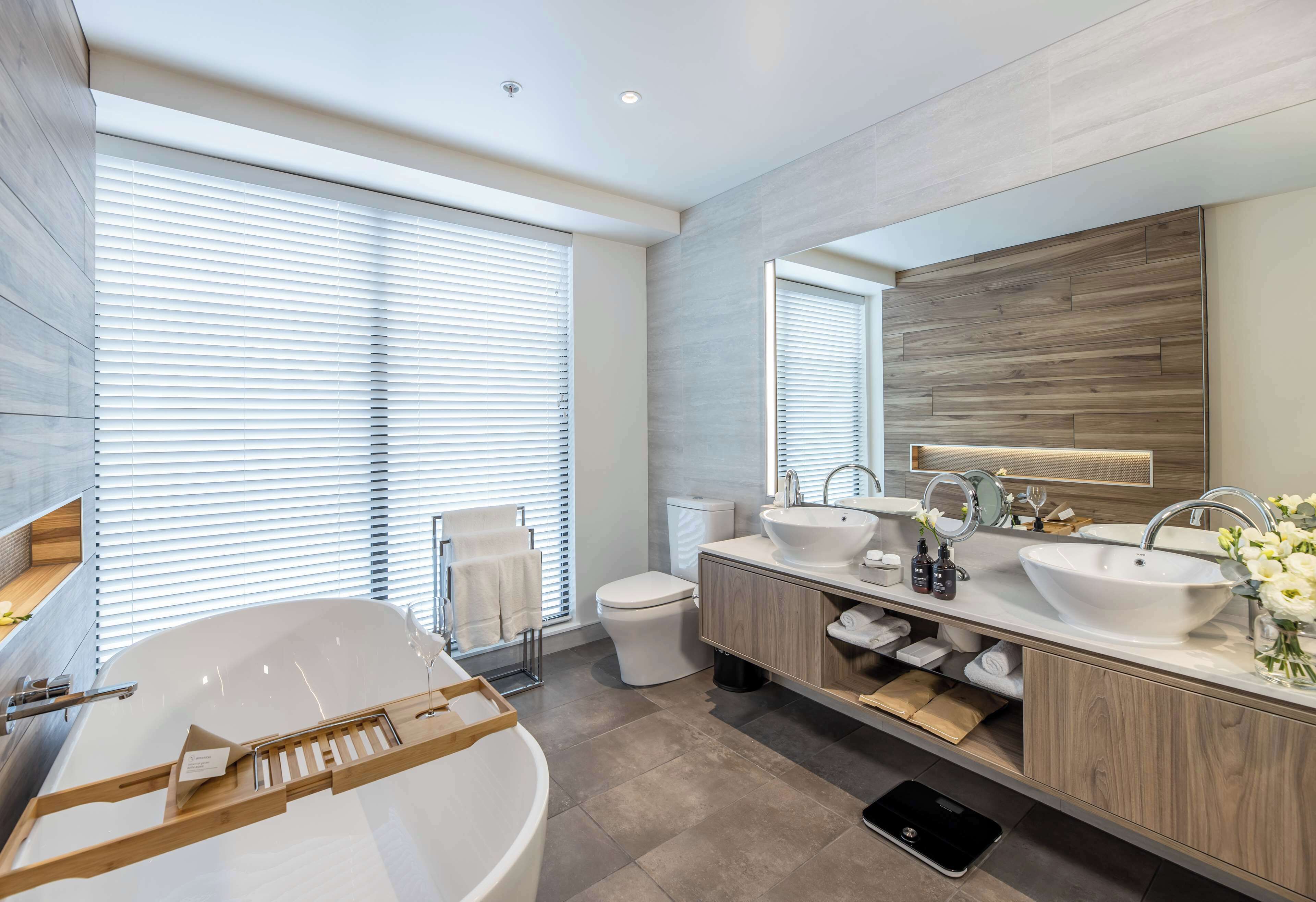 shower, hair dryer, bathrobes, slippers