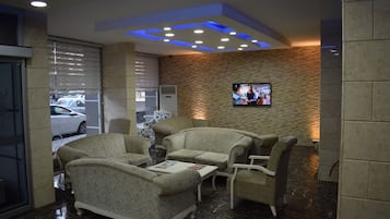 Coin salon dans le hall