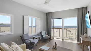 Suite, 1 trÚs grand lit et 1 canapé-lit, balcon, vue océan | Coin séjour