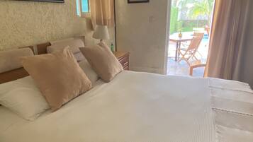 Family Room, Non Smoking, Pool View | Individually decorated, individually furnished, blackout drapes