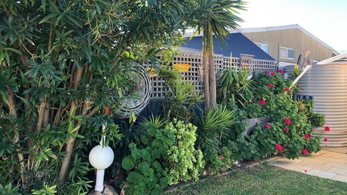 This beach house is full of character and is the perfect way to relax while spending quality time wi