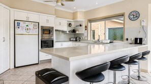 Coffee/tea maker, fridge, microwave, oven