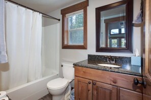 Combined shower/bathtub, hair dryer, towels, soap