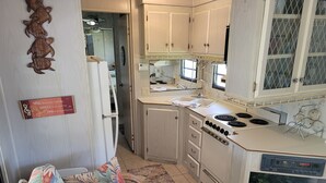 Coffee/tea maker, fridge, microwave, oven