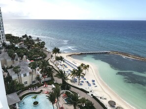 On the beach, sun loungers, beach towels