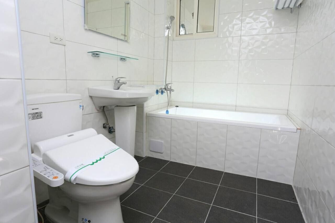 hair dryer, slippers, towels