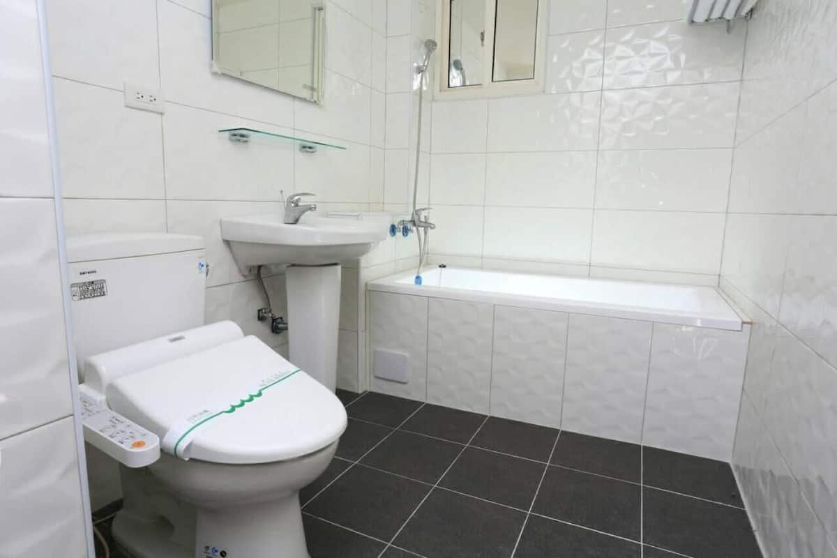 hair dryer, slippers, towels