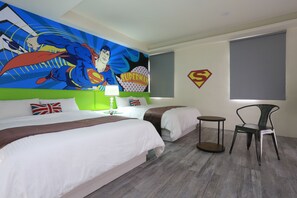 A hotel room with two beds, a Superman mural, a green headboard, a British flag pillow, a Superman logo on the wall, and a window with blinds. - Guo Chen Hotel (Luodong)