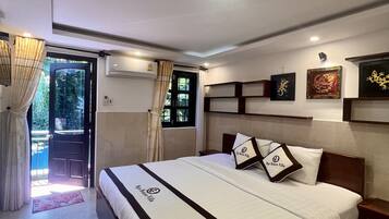 Superior Triple Room | Minibar, in-room safe, desk, free WiFi