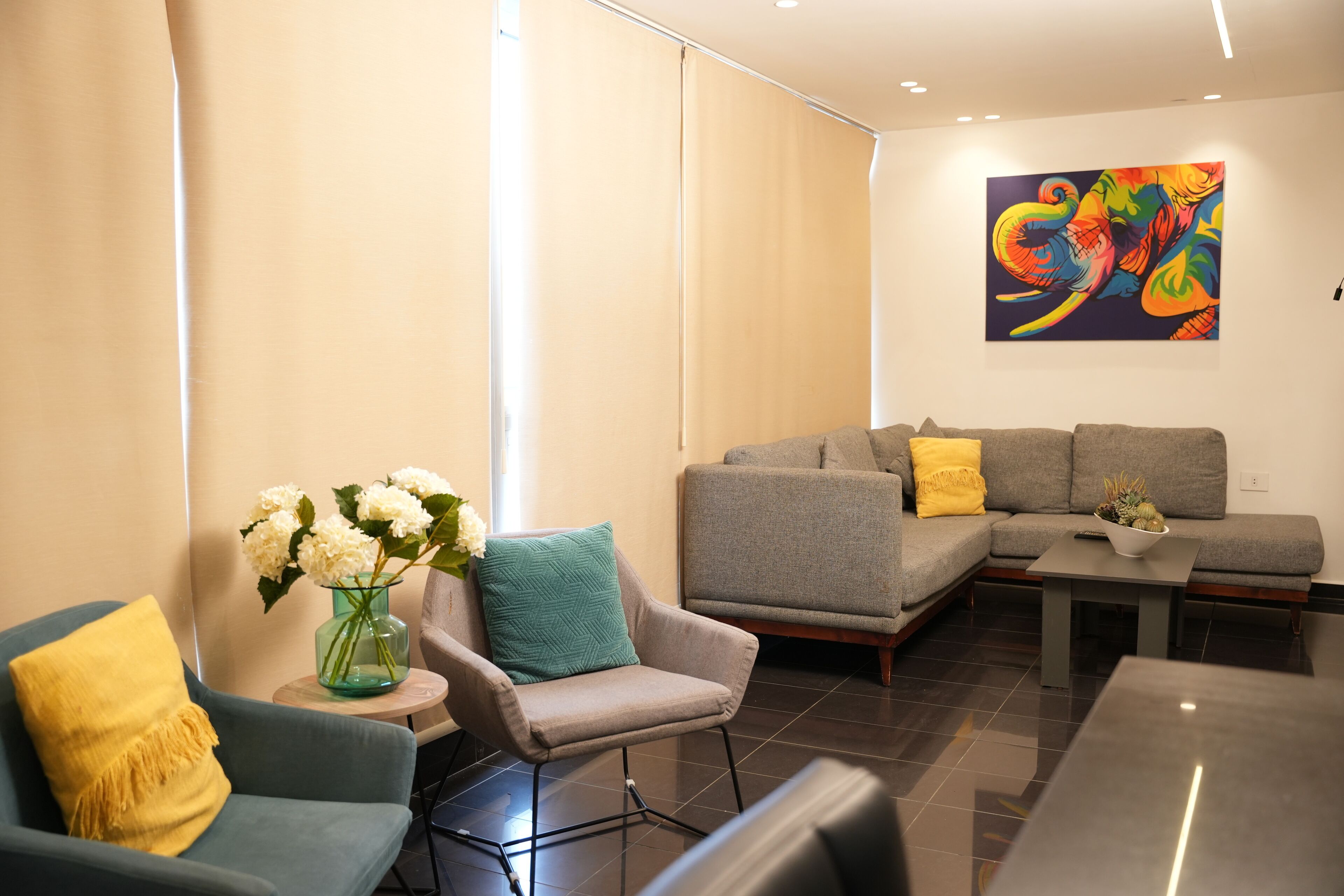 executive studio suite, 1 queen bed | living area | led tv