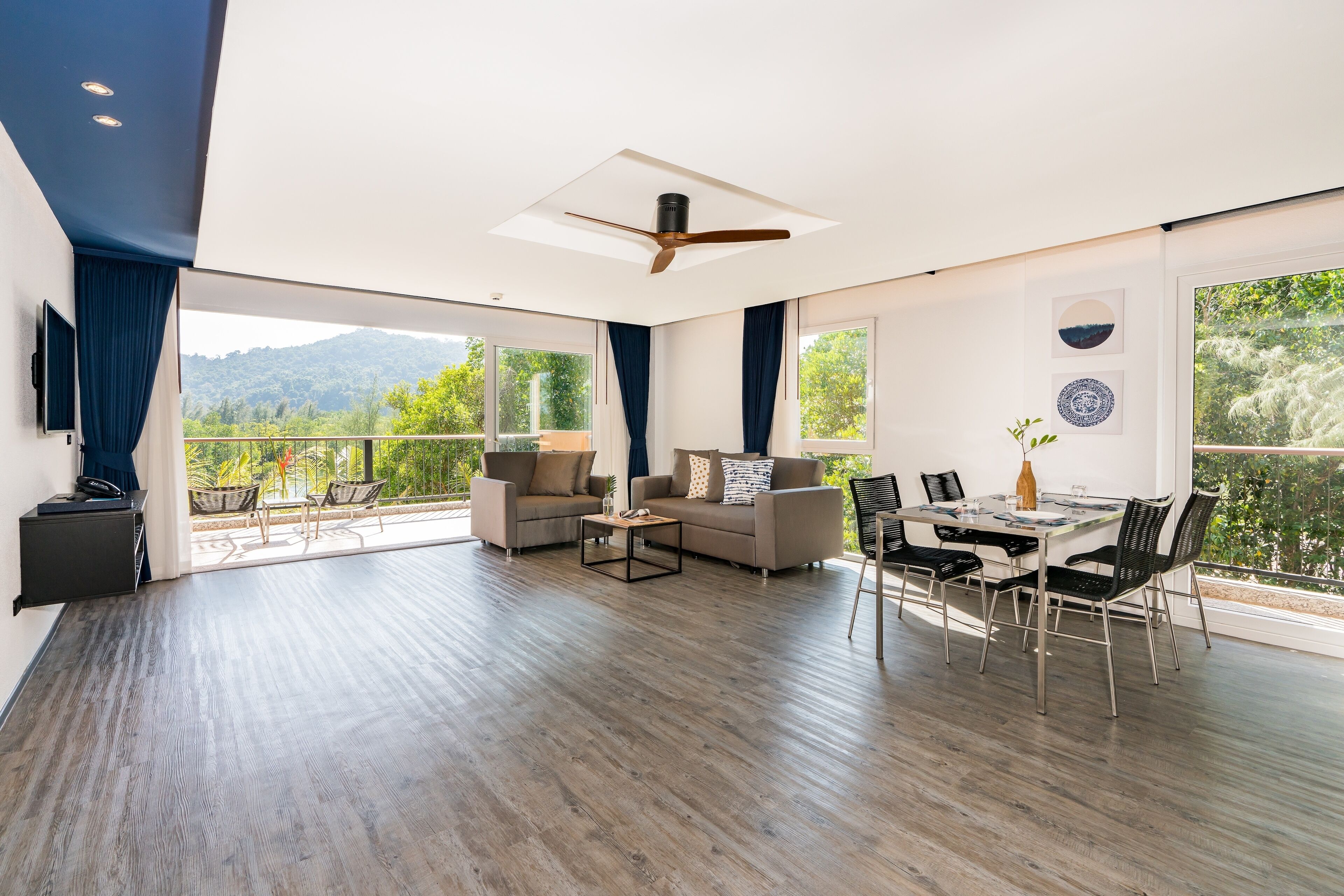 Grand Suite, 2 Bedrooms | Living area | 49-inch Smart TV with cable channels, TV