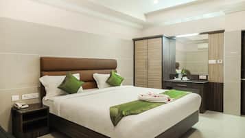 Cortinas blackout, tabla de planchar con plancha y camas extra
