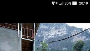 A building with a sign indicating a home stay. - Hoang Hop Homestay - Hostel (Ba Be)