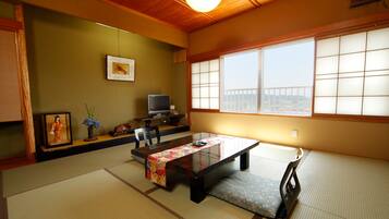 Standard Quadruple Room, Multiple Beds, Smoking | In-room safe, iron/ironing board, free WiFi, bed sheets