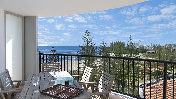 Outdoor dining - Calypso Tower Unit 807 Three bedroom beachfront apartment in central Coolangatta (Coolangatta)