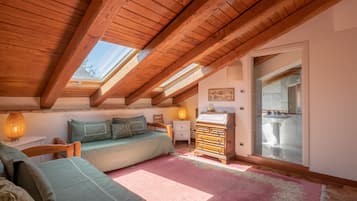 Family Suite, 2 Bedrooms, Garden View | Living area | Flat-screen TV