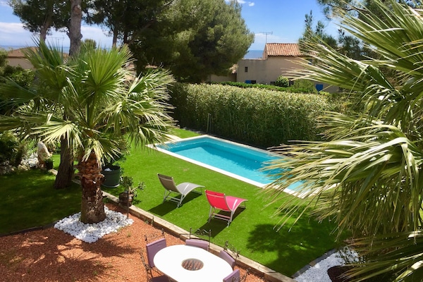 Seasonal outdoor pool, open 8:30 AM to 9:00 PM, pool loungers