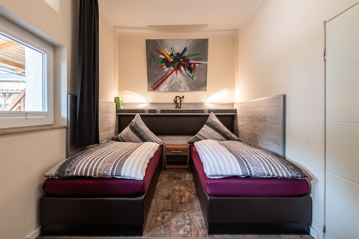 business double or twin room, 2 single beds | desk, laptop workspace, blackout curtains, soundproofing