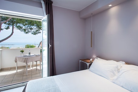 Minibar, caja de seguridad en la habitación, wifi gratis y ropa de cama . Mane Boutique Hotel