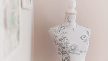 A mannequin with floral patterns.