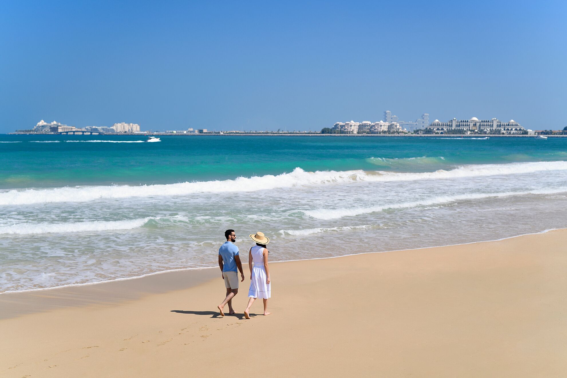 private beach, white sand, beach cabanas, sun-loungers