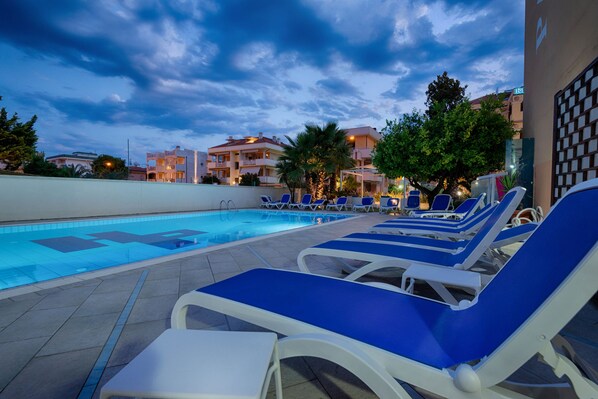 Seasonal outdoor pool, sun loungers