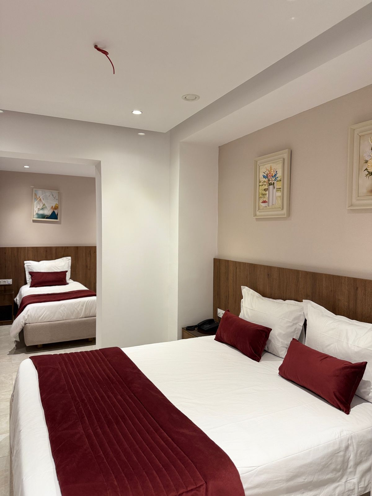 Triple Room | Desk, blackout curtains, iron/ironing board, free cots/infant beds