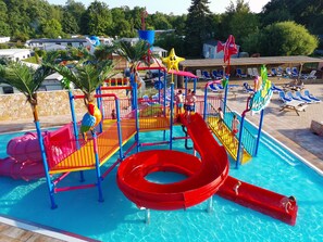 A water park with slides, a pool, and a 'Welcome' sign. - Eurocamp Spreewaldtor (Märkische Heide)